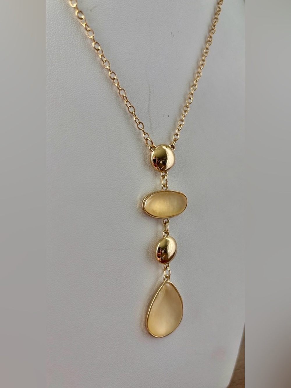 Tahari Oval & Teardrop drop pendant creamy translucent,smaller shiny gold beads
